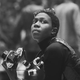 Political & social activist and Black Panther member Afeni Shakur (right) holds a camera as she attends a session of the Revolutionary People’s Constitutional Convention, Philadelphia, Pennsylvania, between September 4 and 7, 1970. The convention was organized by the Black Panther Party to draft a new Constitution of the United States and unify factions of the radical left. (Photo by David Fenton/Getty Images)